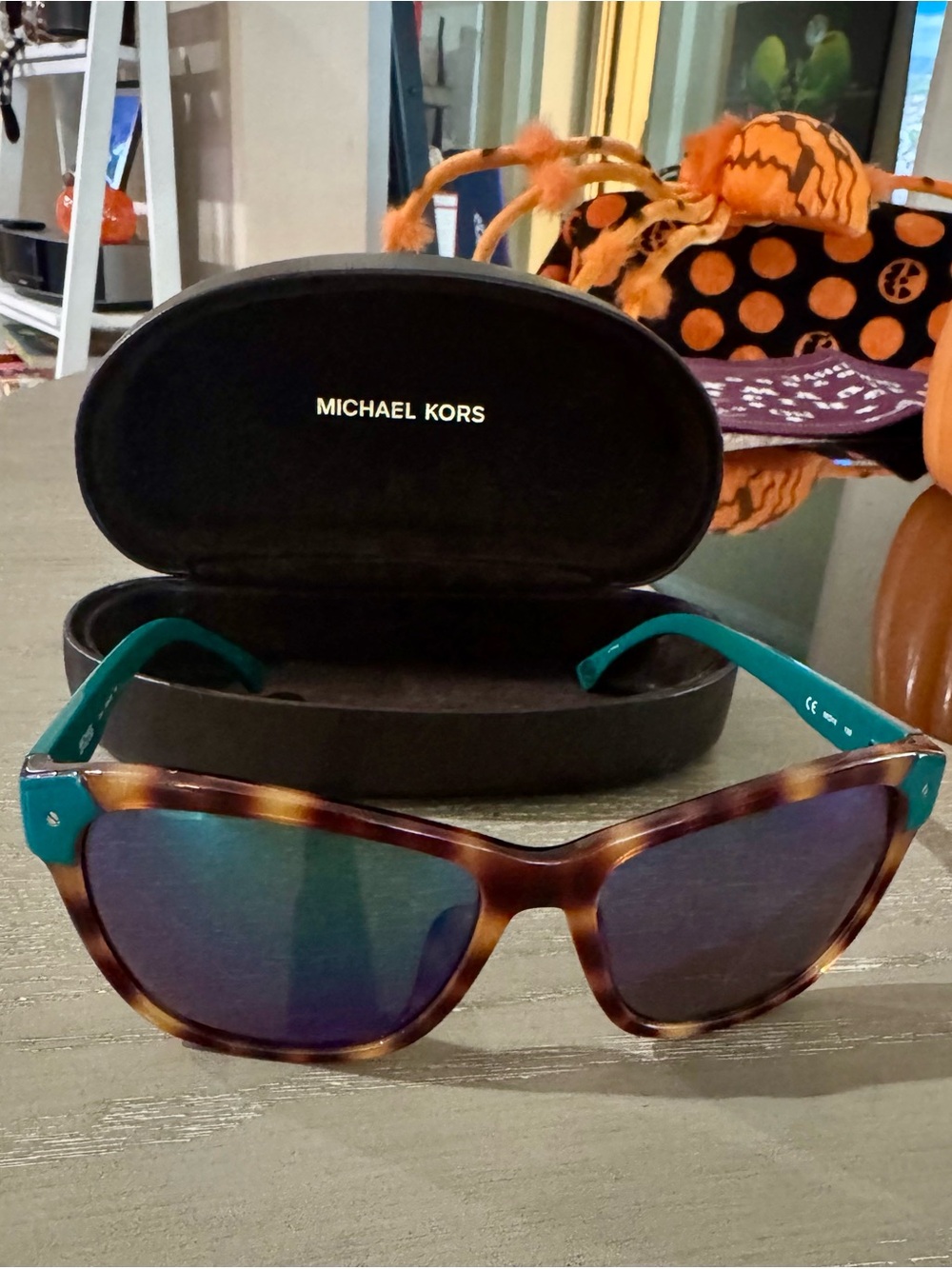 Michael Kors Tortoise Frame Sunglasses with Teal Temples and Blue Mirrors